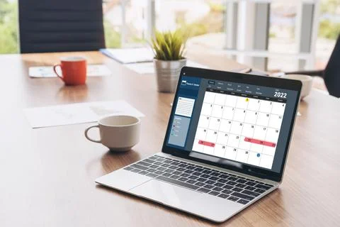 Calendar on computer software application for modish schedule planning Stock Photos