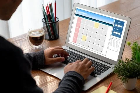 Calendar on computer software application for modish schedule planning Stock Photos