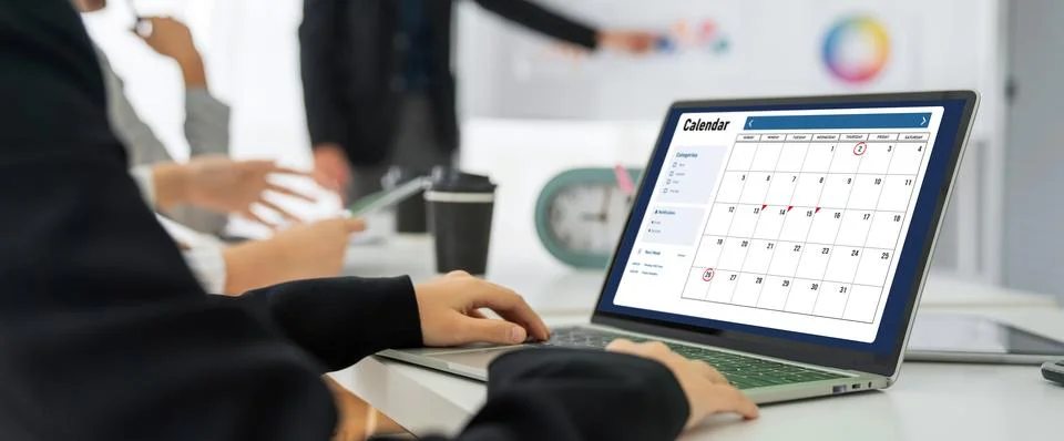 Calendar on computer software application for modish schedule planning Stock Photos