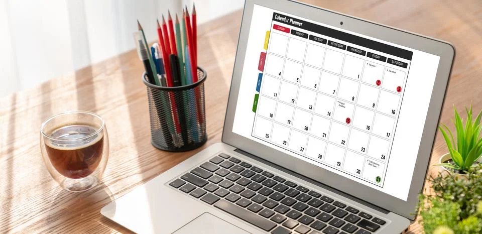 Calendar on computer software application for modish schedule planning Stock Photos