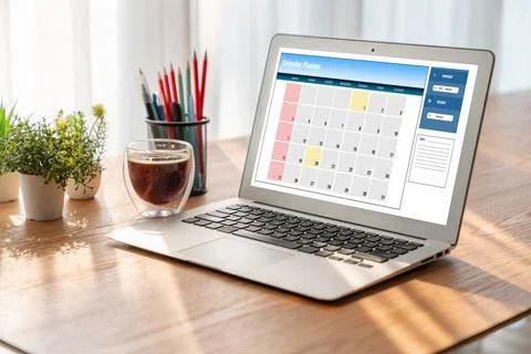 Calendar on computer software application for modish schedule planning Stock Photos