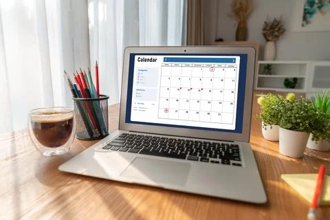 Calendar on computer software application for modish schedule planning Stock Photos