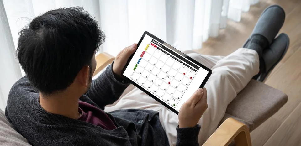 Calendar on computer software application for modish schedule planning Stock Photos