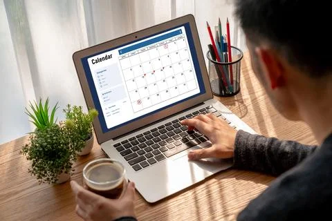 Calendar on computer software application for modish schedule planning Stock Photos