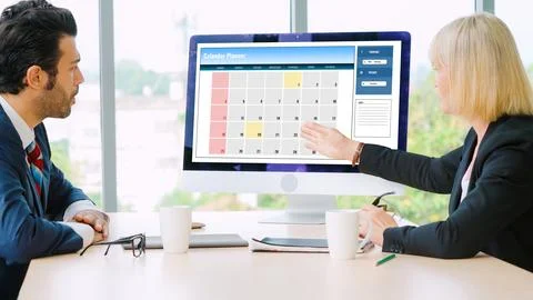 Calendar on computer software application for modish schedule planning Stock Photos