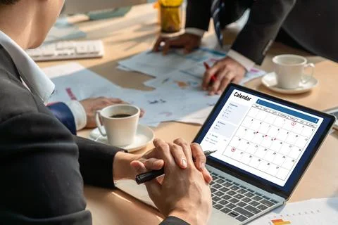 Calendar on computer software application for modish schedule planning Stock Photos