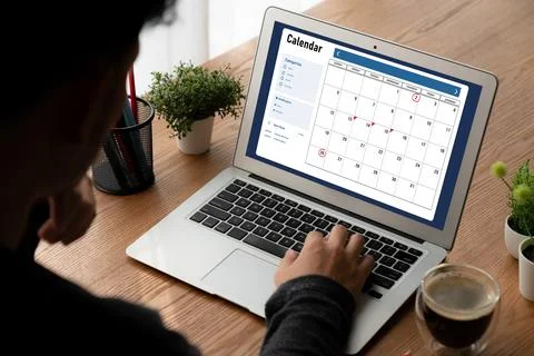 Calendar on computer software application for modish schedule planning Stock Photos