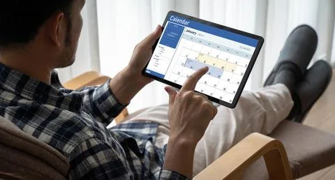 Calendar on computer software application for schedule planning snugly Foto stock