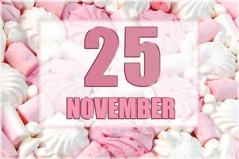 Calendar date on the background of white and pink marshmallows. November 25 i Stock Photos