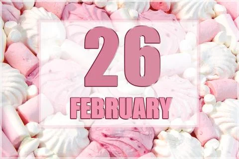 Calendar date on the background of white and pink marshmallows. February 26 i Stock Photos