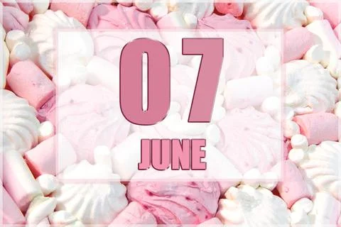 Calendar date on the background of white and pink marshmallows.  June 7 is th Stock Photos