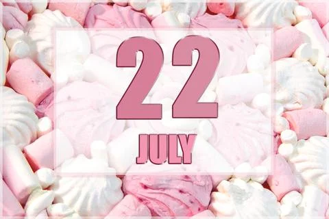 Calendar date on the background of white and pink marshmallows. July 22 is th Stock Photos