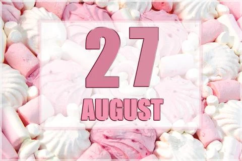 Calendar date on the background of white and pink marshmallows. August 27 is  Stock Photos