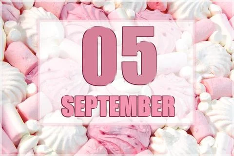 Calendar date on the background of white and pink marshmallows.  September 5  Stock Photos