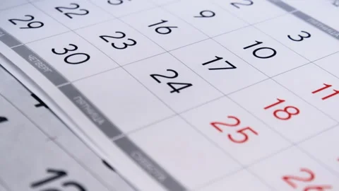 Calendar pages flipping close up Stock Footage 203840139