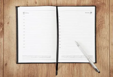 Calendar with pen Stock Photos