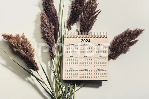 Calendar Year 2024 schedule. 2024 desk calender notepad on white desk ...