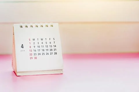 Calender of Apirl 2018 on table with gradient Photos