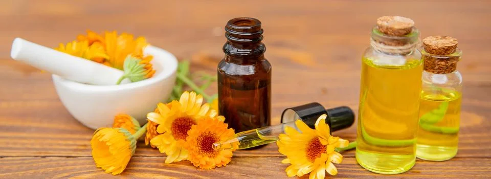 The calendula extract. Medicinal plants. Selective focus. Stock Photos