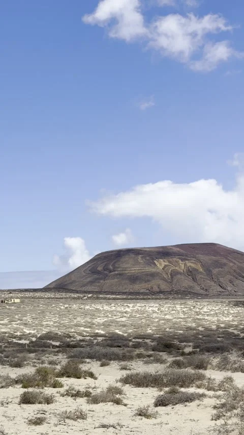 Caleta de Sebo with Pico de las Arugas and Arid Island Landscape of La Graciosa Stock Footage 320123072