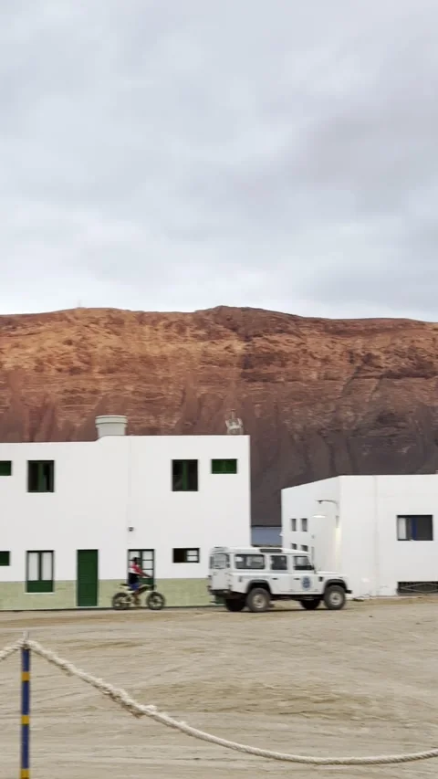 Caleta de Sebo at Sunset with Risco de Famara View in La Graciosa Stock Footage 320123094