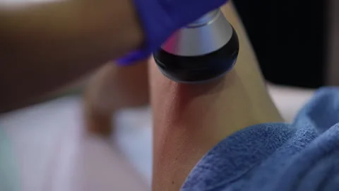 Calf muscle therapy involves smooth hand movements for recovery Stock Footage 326064979