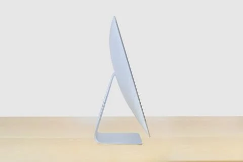 Calgary, Alberta, Canada. Dec 17, 2020. Side view of an iMac computer on a wo Stock Photos