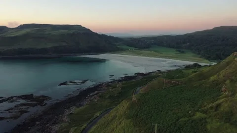Calgary Beach At Sunset Passing Over The Mountains Stock Footage 171107309