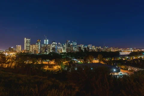 Calgary cityscape transitioning to night Stock Footage 69034741
