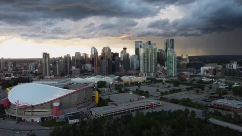 Calgary skyline during a storm and sunset Stock Footage