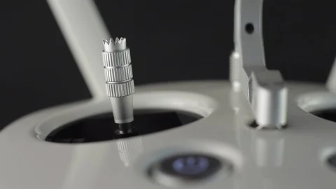 Calibrating stick of remote controller. Preparing a drone before flight. Close Stock Footage 128631074