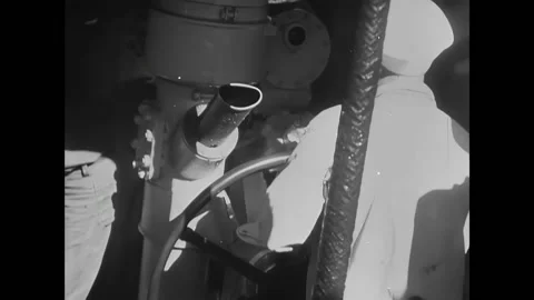 CALIFORNIA - 1941 - Workers man the controls and look through the periscope Stock Footage 337708159