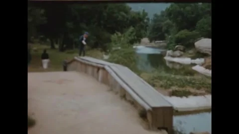CALIFORNIA - 1950s - Actors falling down as spectators watch a film shooting. Stock Footage 340582381