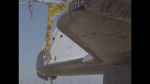 CALIFORNIA - 1985 - The Space Shuttle Atlantis' landing gear is highlighted as Stock Footage 341516149