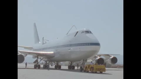 CALIFORNIA - 1985 - The Space Shuttle Atlantis is lowered to a runway from a Stock Footage 341516183
