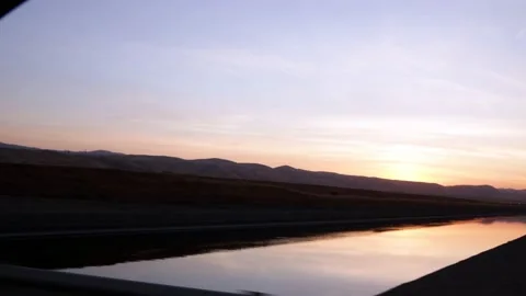 The California Aqueduct at sunset Stock Footage 162391997