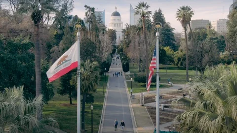 California Capitol building view with flags and park. Sacramento, USA Video stock 101308786