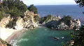 California Coasts Big Sur McWay Fall 23 Arch Rock Zoom In HD Footage