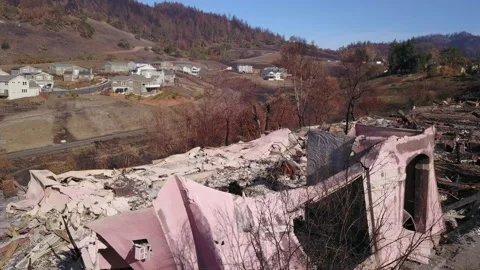 California Fire Damaged Devastated House Overlooking Canyon of Unburnt Homes 動画素材 143300253