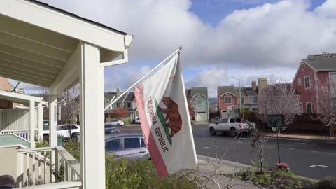 California Flag With Clouds In The Suburbs Stock Footage 236182378