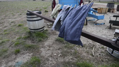California Trail, wagon, clothes drying in desert wind along the Humboldt River Stock Footage 166925885