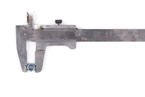 Caliper and nut closeup isolated on white background Stock Photos