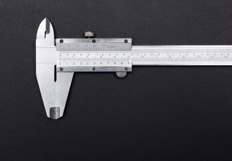 Caliper on black background Stock Photos
