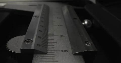 Caliper Measuring. TO PRECISELY MEASURE THE DIAMETER Stock Footage 309452510
