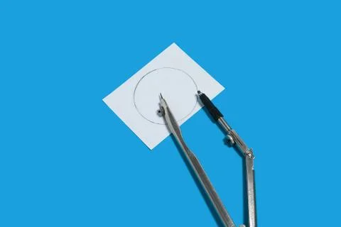 Calipers and a notation paper Stock Photos