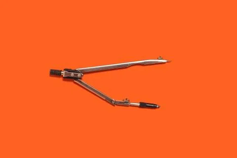 Calipers on an orange background Stock Photos