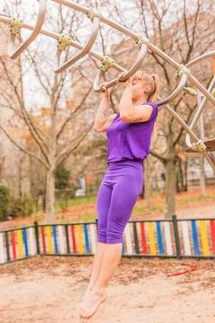 Calisthenics pull- up back exercise for cross fitness workout. Hispanic mid Stock Photos