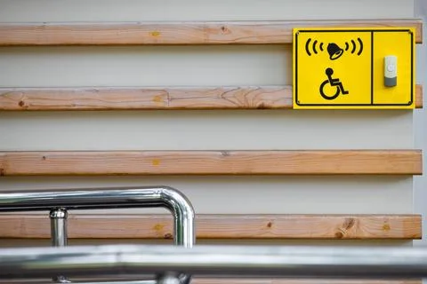 Call button for help for a person with mobility restrictions. Stock Photos