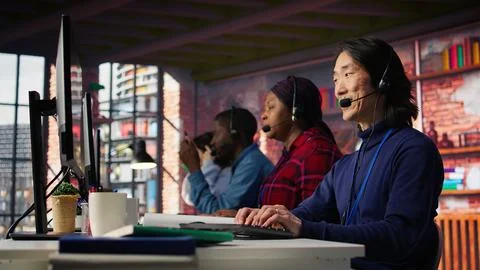 Call center admin team working together to provide live chat support Foto stock