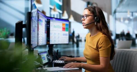 Call Center Agent Efficiently Manages Customer Calls Using Smart Software Das Stock Photos